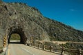 Road on rocky landscape passing through tunnel Royalty Free Stock Photo