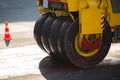 Road roller compacting asphalt during road repairs. Royalty Free Stock Photo
