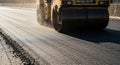 Road Roller Compacting New Asphalt on Street During Construction Process Royalty Free Stock Photo