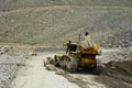 Road roller on the mountain road in northern India Royalty Free Stock Photo