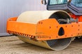 The road roller works on the construction site of a new building Royalty Free Stock Photo