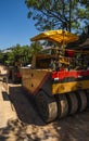 Road rollers working on the new roads construction site. Heavy duty machinery working on highway. Construction equipment