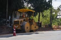 Road rollers working on the new roads construction site. Heavy duty machinery working on highway. Construction equipment Royalty Free Stock Photo