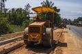 Road rollers working on the new roads construction site. Heavy duty machinery working on highway. Construction equipment Royalty Free Stock Photo