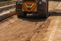 Road rollers working on the new roads construction site. Heavy duty machinery working on highway. Construction equipment Royalty Free Stock Photo