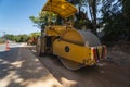 Road rollers working on the new roads construction site. Heavy duty machinery working on highway. Construction equipment