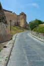 Road among ruins of the old castle Royalty Free Stock Photo