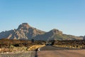 Road running through arid volcanic wasteland On Tenerife. Royalty Free Stock Photo