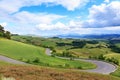 Road rural landscape of Tuscany and green rolling hills near Vol Royalty Free Stock Photo