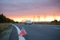 Emergency road triangle on the road