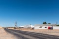 Road scene, with businesses, near Kononeiland