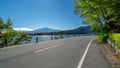 Road Scenery with Lake and Mountain Landscape