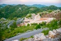 Road services carry out laying and repair of the mountain road. Royalty Free Stock Photo