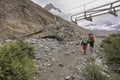 The road between Shimshal village 3100m and Upper Shimshal 5,680m runs through steep gorges on narrow paths and hollowed out i