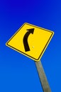Road sign against a blue sky clipping path. Royalty Free Stock Photo