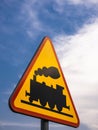 Road sign attention railway in yellow, red and black Royalty Free Stock Photo