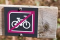Road sign bicycle forbidden No Cycling on park forest path way sign indicating passage prohibited to bicycles Royalty Free Stock Photo