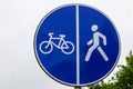 Road sign of bike path and pedestrian zone. Background with copy space Royalty Free Stock Photo