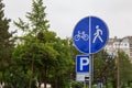 Road sign of bike path and pedestrian zone. Background with copy space Royalty Free Stock Photo