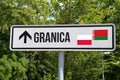 A road sign and border between Poland and Belarus