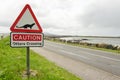 Road sign on a countryside road warning for otters crossing