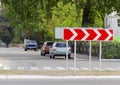 Road sign curve chevrons on a city street