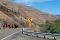 Road Sign on Curving Mountain Road in eastern Oregon