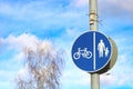 Road sign depicting separation between footpath and cycle lane Royalty Free Stock Photo