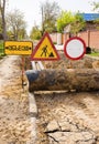 Road sign Detour. Construction workers make repairs urban highways engineering Royalty Free Stock Photo