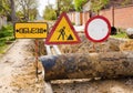 Road sign Detour. Construction workers make repairs urban highways engineering Royalty Free Stock Photo