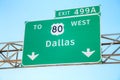 Road sign with the direction to Dallas Royalty Free Stock Photo