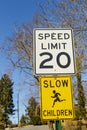 Road sign displaying 20 mph speed limit warning Royalty Free Stock Photo