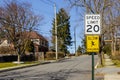 Road sign displaying 20 mph speed limit warning Royalty Free Stock Photo