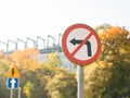 Road sign don`t turn left, Triangular traffic sign indicating a turn right Royalty Free Stock Photo