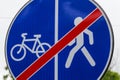 Road sign end of the pedestrian zone and the bike path. Background with copy space Royalty Free Stock Photo