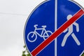 Road sign end of the pedestrian zone and the bike path. Background with copy space Royalty Free Stock Photo