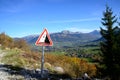 Road sign falling rocks on a mountain path Royalty Free Stock Photo