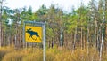 Road sign imoose are crossing highway Royalty Free Stock Photo