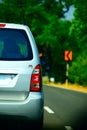 Road sign indicating a left turn on a high way Royalty Free Stock Photo