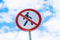 A road sign indicating \'No Pedestrian Traffic\' against a gray sky background