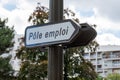 Road sign indicating `PÃÂ´le emploi` job center written in French