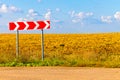 road sign indicating a sharp right turn