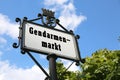 road sign indicating the square called Gendarmenmarkt inEast Ber