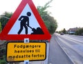 Road sign with information on roadworks ahead