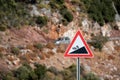 Road sign informing about steep rise on the mountain serpentine