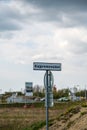 A road sign informing visitors that the quay promenade starts here next to a construction site in Lund Sweden