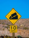 Traffic alerts downhill slope, mojave desert USA Royalty Free Stock Photo