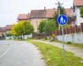 Road sign that warns drivers on possibility of parents and children on the road Royalty Free Stock Photo