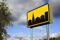 Road sign settlement on the sky background Royalty Free Stock Photo