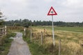 Road sign of low flying aircraft in the nature park at Roode Beek, Schinveld, Netherlands Royalty Free Stock Photo